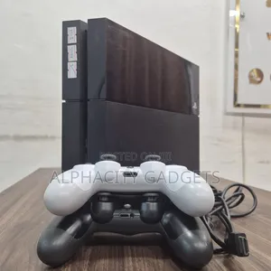 PS4 With FC27 6 Games of Your Choice and 2 Pads