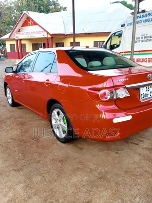 Toyota Corolla L 4-Speed Automatic 2013 Orange