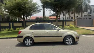 Kia Rio LX 4dr Sedan (1.6L 4cyl 4A) 2010 Gold