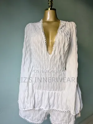White Long Sleeve v Neck Romper