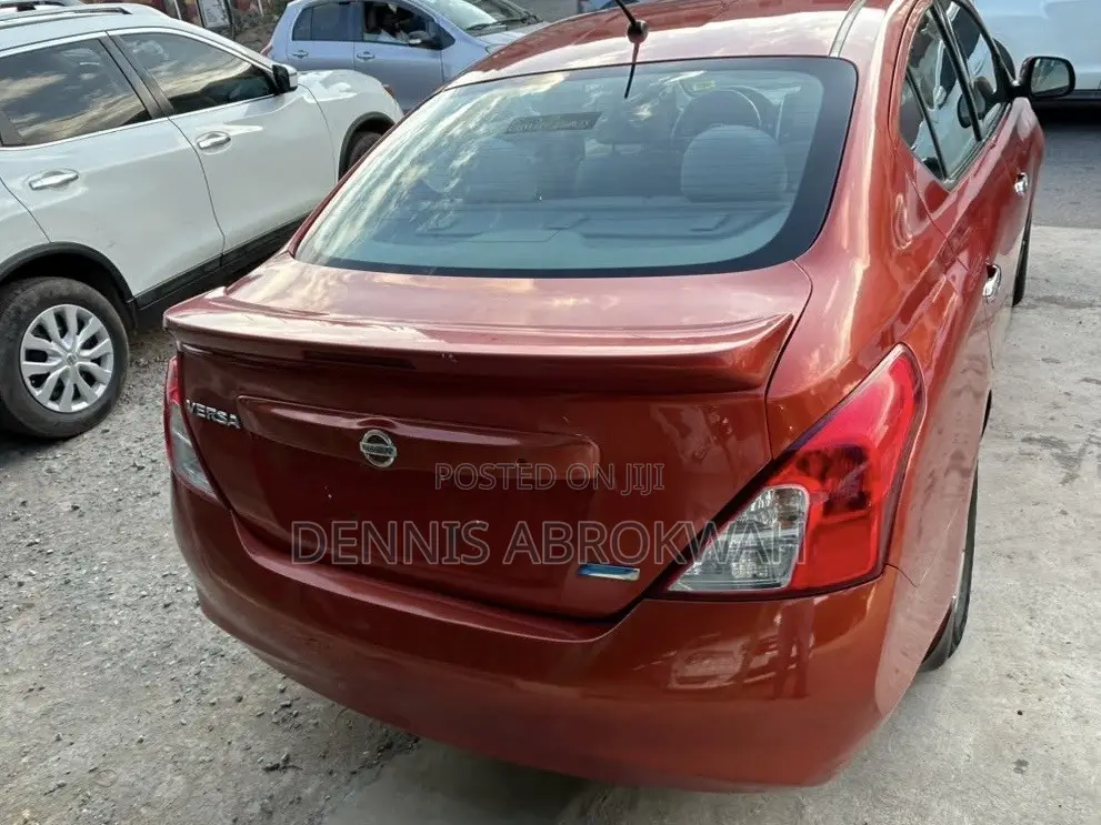 Nissan Versa 1.6 S 4dr Sedan (1.6L 4cyl 4A) 2014 Orange