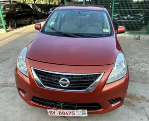 Nissan Versa 1.6 S 4dr Sedan (1.6L 4cyl 4A) 2014 Orange