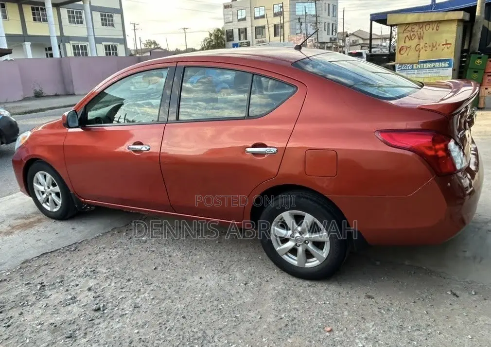 Nissan Versa 1.6 S 4dr Sedan (1.6L 4cyl 4A) 2014 Orange