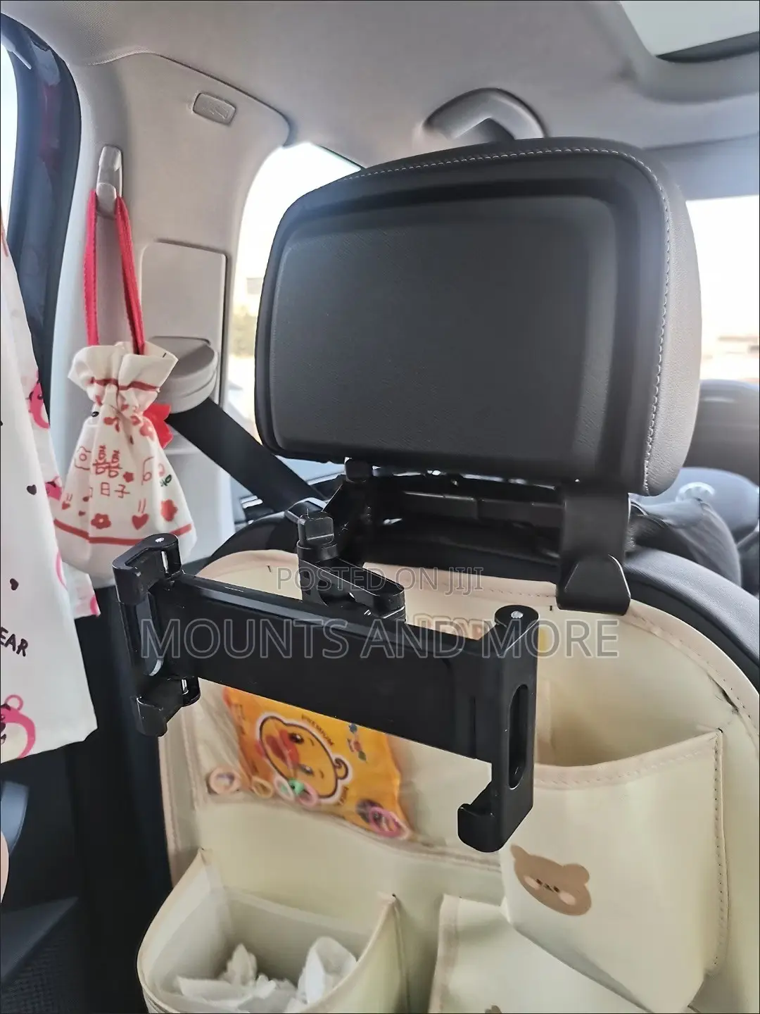Backseat Tablet/Smartphone Headrest.