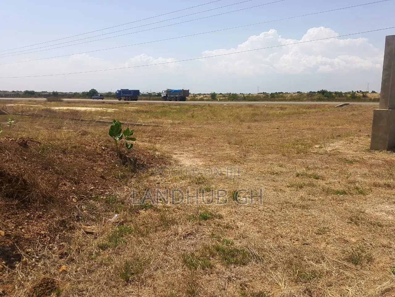 Land by Roadside.100 Acres.Titled.Developed Area(Tsopoli)