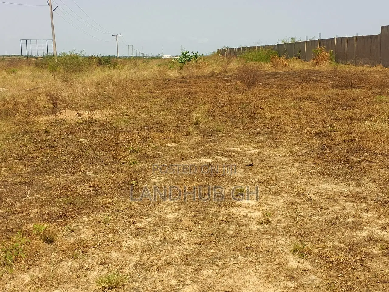 Land by Roadside.100 Acres.Titled.Developed Area(Tsopoli)