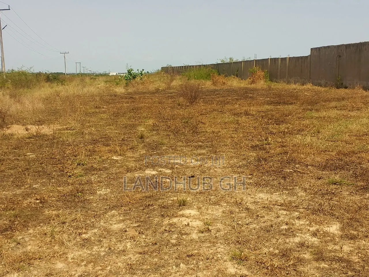 Land by Roadside.100 Acres.Titled.Developed Area(Tsopoli)