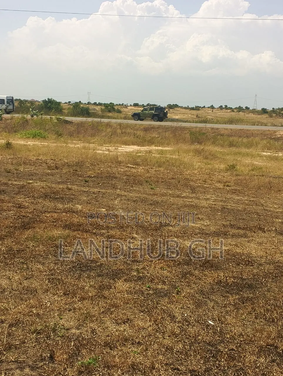 Land by Roadside.100 Acres.Titled.Developed Area(Tsopoli)