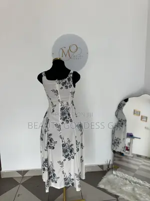 White With Black Floral Designs Dress Available