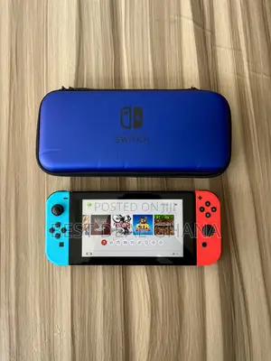 Nintendo Switch With Games and Carrying Case