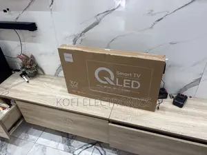 A Slim Syinix 32-Inch S66H Smart QLED TV – Built-in Satellite Receiver