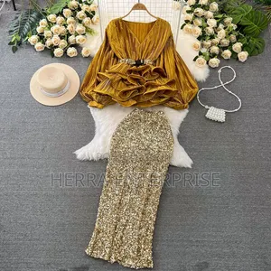 Elegant Two-Piece Outfit Features a White v-Neck Pleated Ruffle Blouse