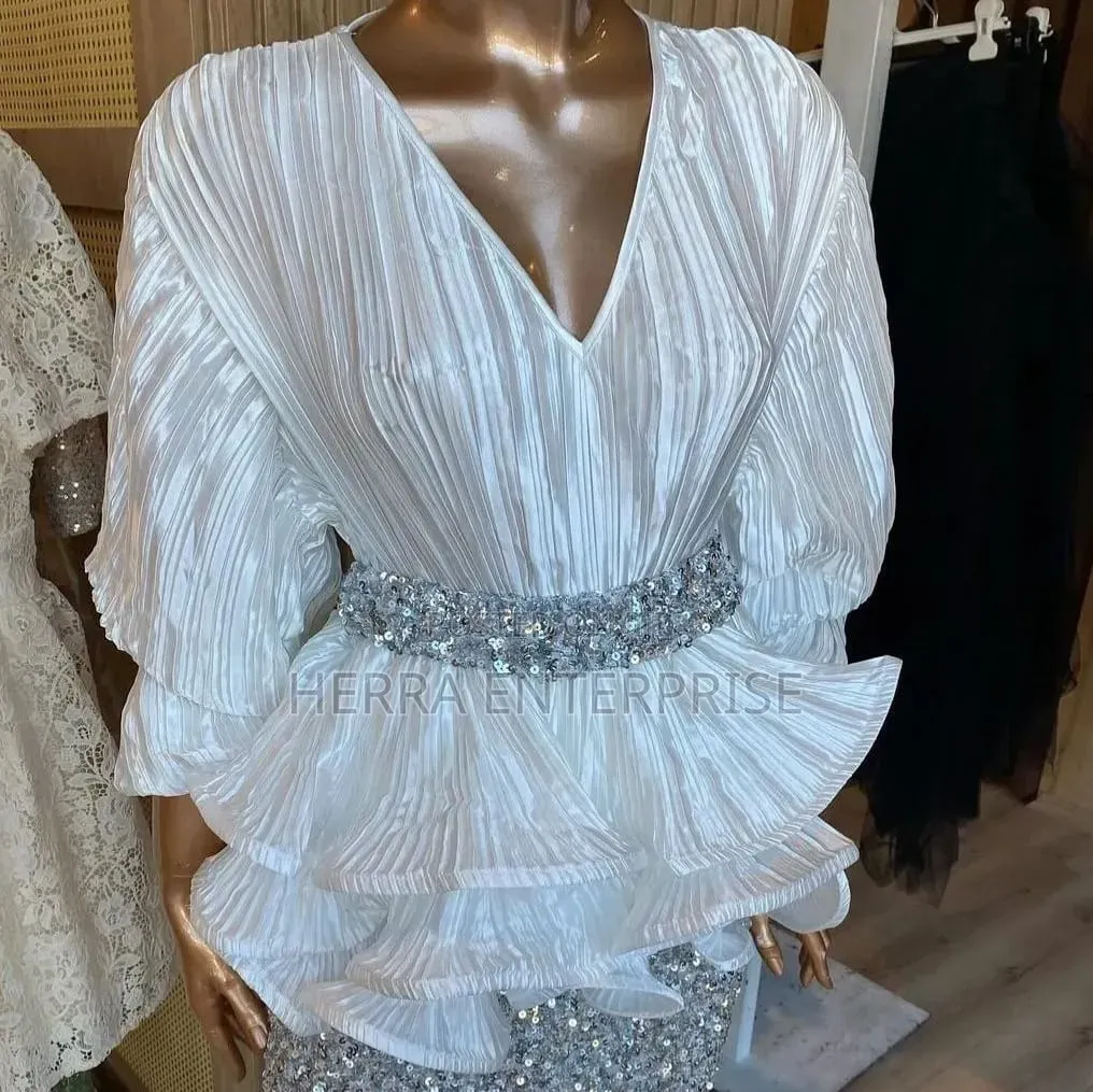 Elegant Two-Piece Outfit Features a White v-Neck Pleated Ruffle Blouse