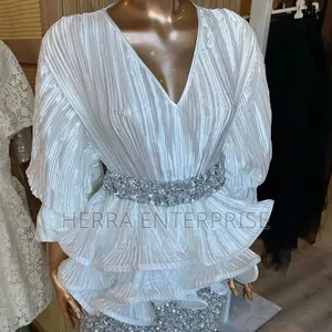Elegant Two-Piece Outfit Features a White v-Neck Pleated Ruffle Blouse