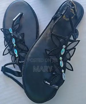 A Pair of Black Butterfly Crystal Rhinestone Flat Thong Sandals