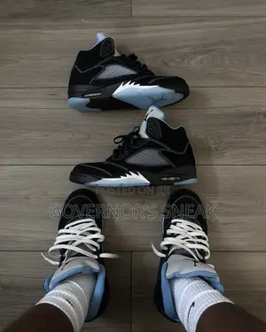 Jordan 4 Black Carolina