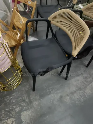 Modern Polypropylene Dining Armchair Featuring a Woven Rope Backrest