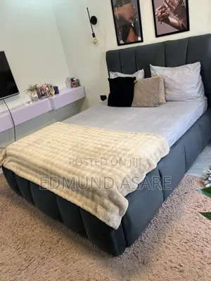 Slightly Used Double Bed Mattress With Bed Frame and a Side Carbinet
