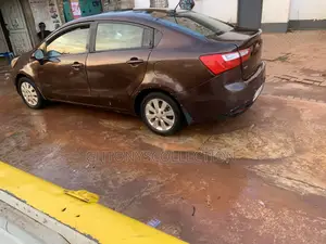 Kia Rio LX 4dr Sedan (1.6L 4cyl 6M) 2013 Brown