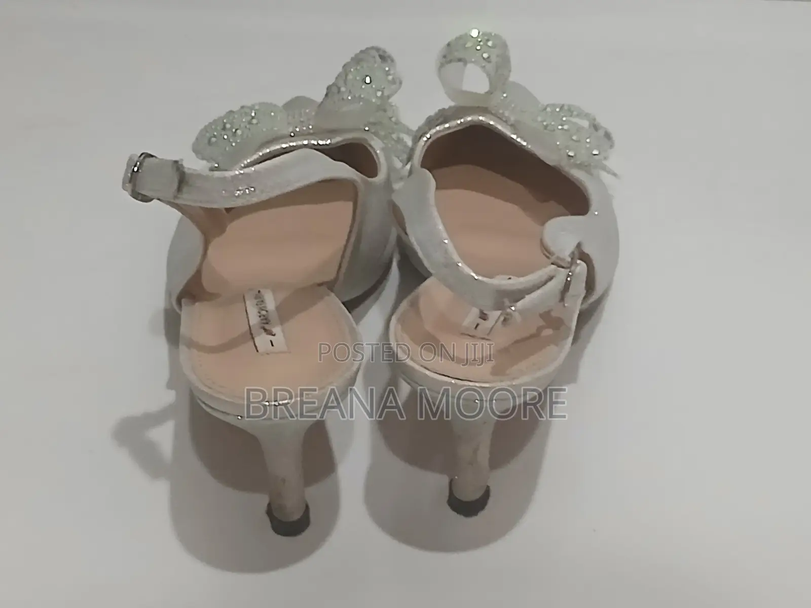 AARON FAIRY Silver Shimmer Slingback Heels With Rhinestone Bow