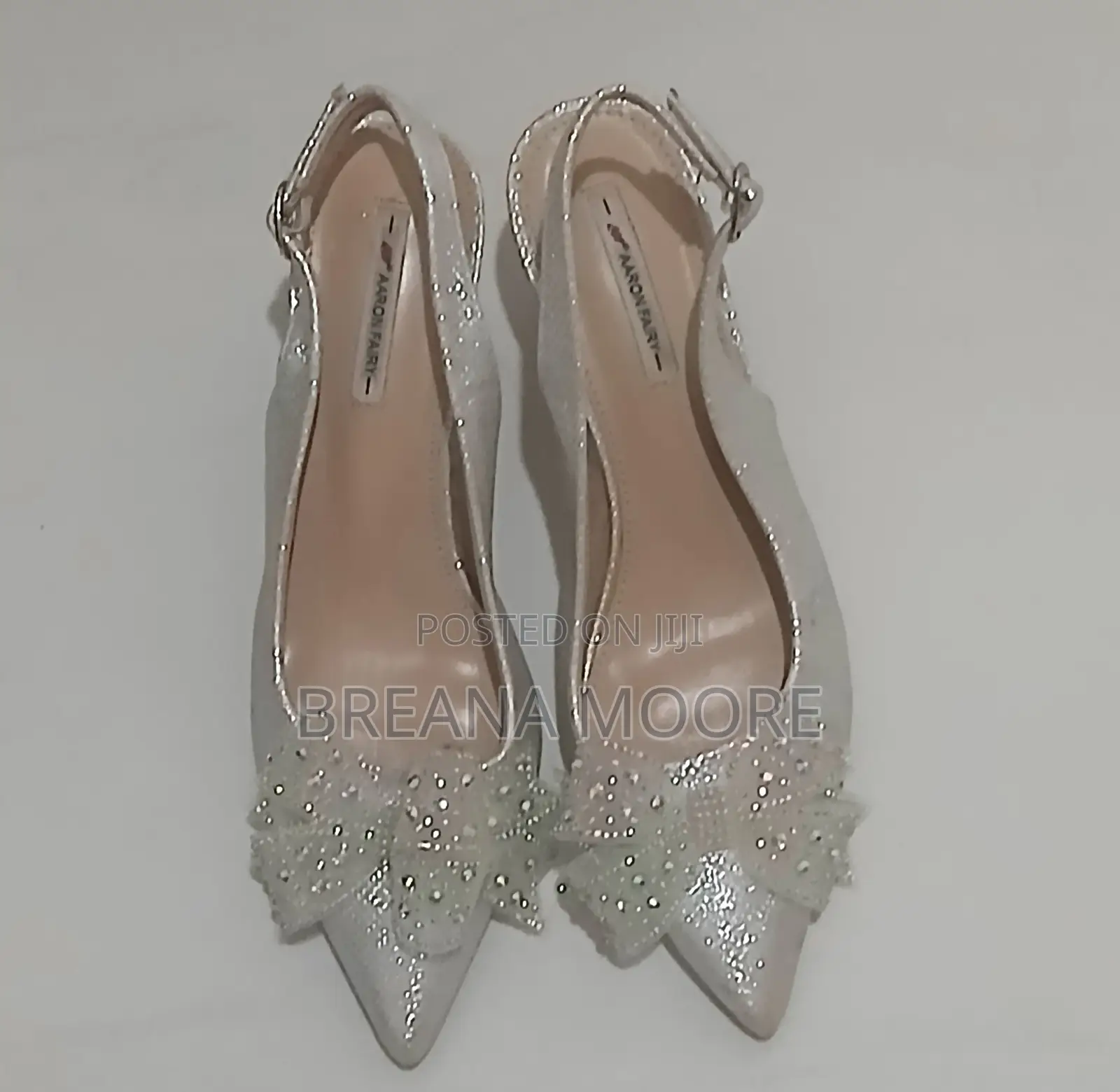 AARON FAIRY Silver Shimmer Slingback Heels With Rhinestone Bow