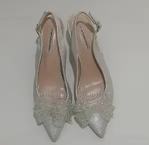 AARON FAIRY Silver Shimmer Slingback Heels With Rhinestone Bow