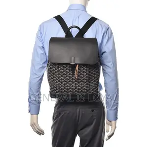 Goyard Alpin MM Backpack in Black Coated Canvas and Calfskin Leather.