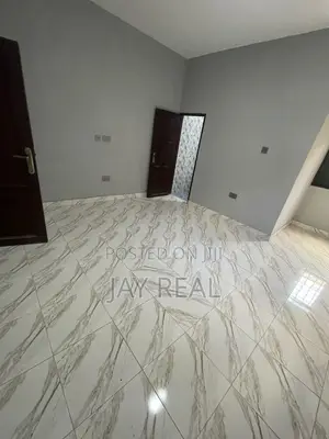 Road Side Plot With a Single Room Structure.