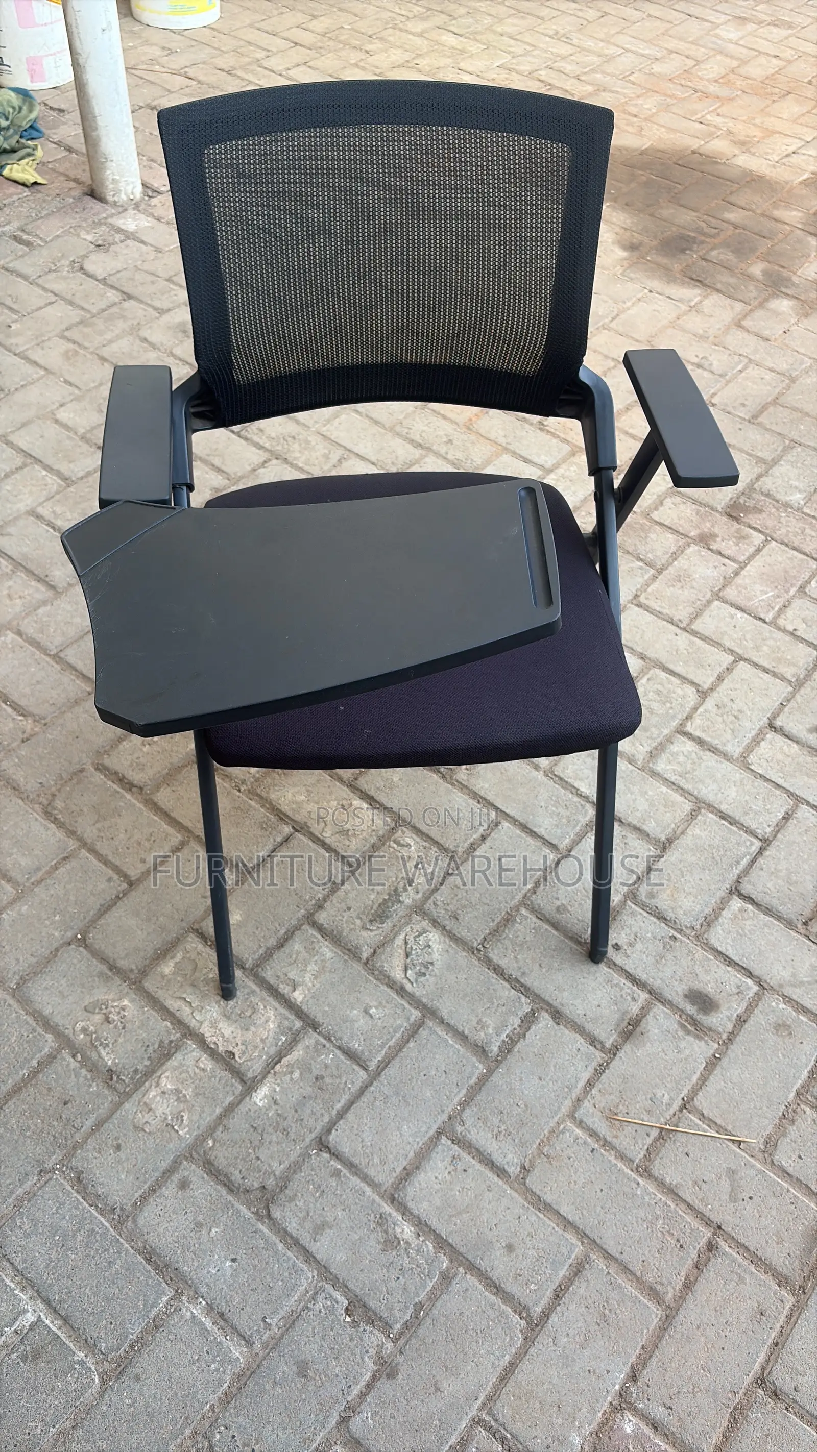 Ergonomic Mesh Training Chair With Foldable Writing Tablet Arm.