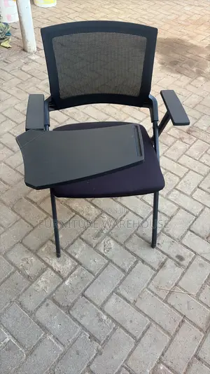 Ergonomic Mesh Training Chair With Foldable Writing Tablet Arm.