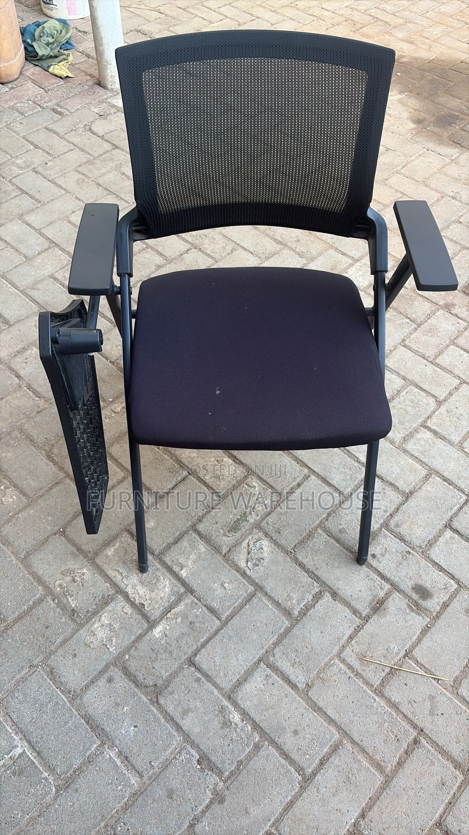 Ergonomic Mesh Training Chair With Foldable Writing Tablet Arm.