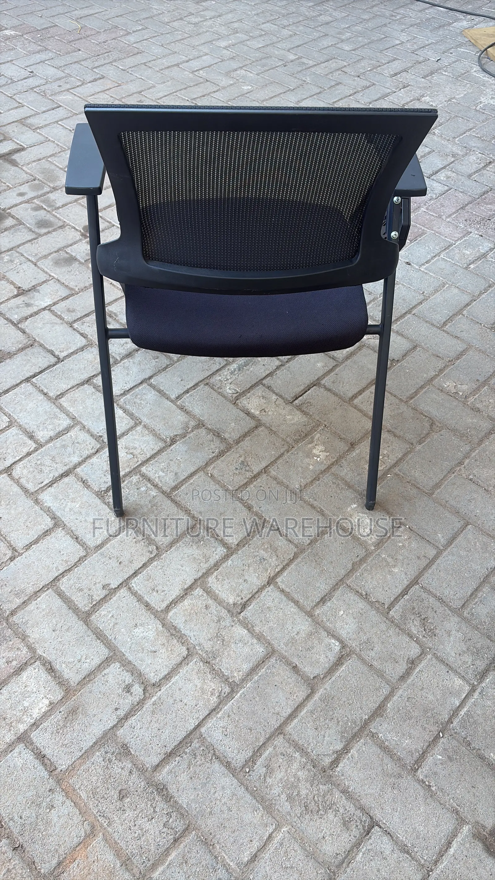 Ergonomic Mesh Training Chair With Foldable Writing Tablet Arm.