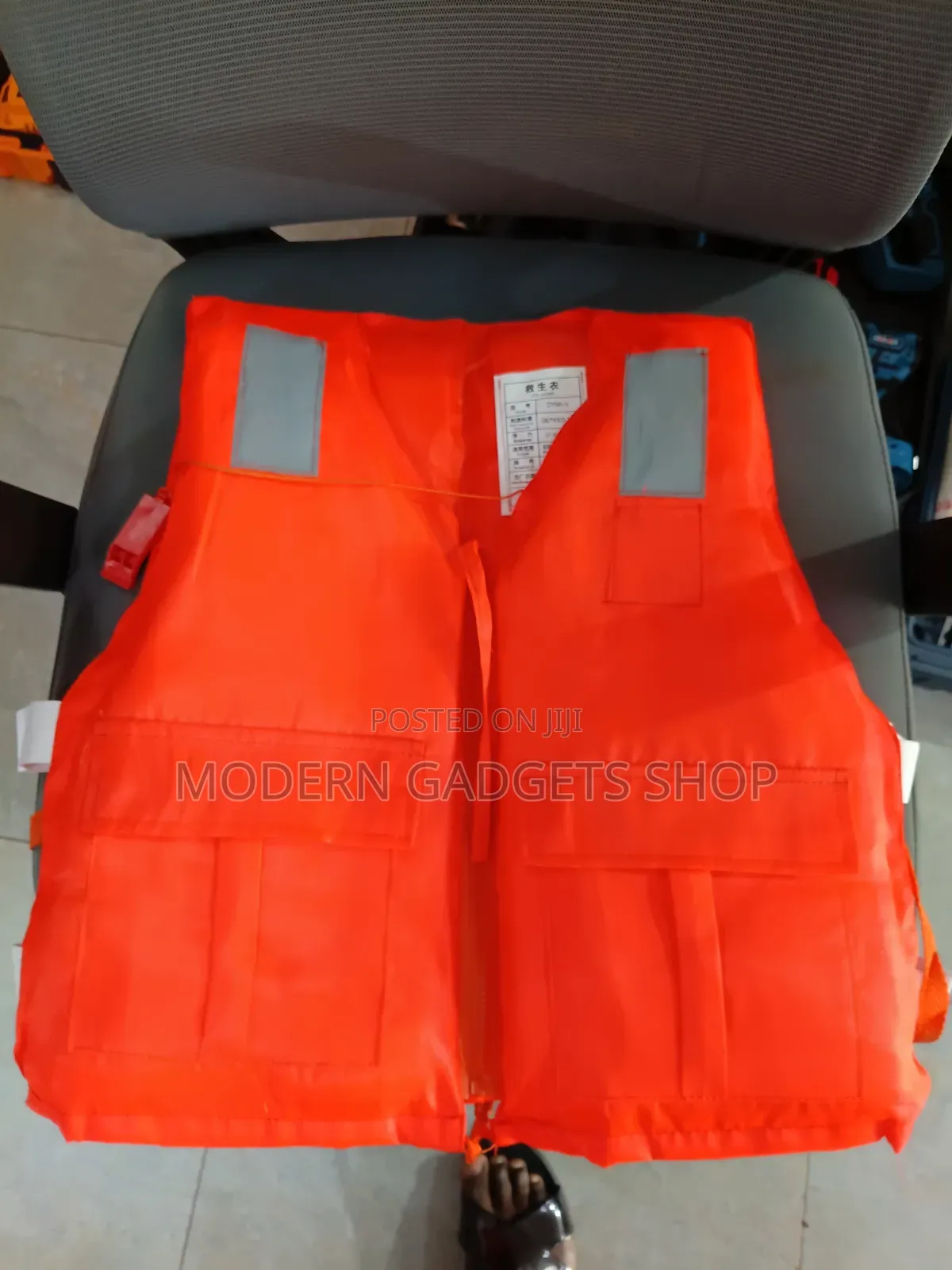 High-Visibility Orange Life Jacket With Reflective Strips