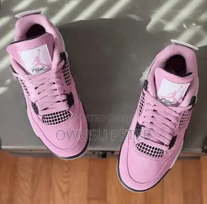 Pink Jordan 4 Retro Sneakers