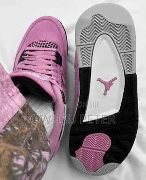 Pink Jordan 4 Retro Sneakers