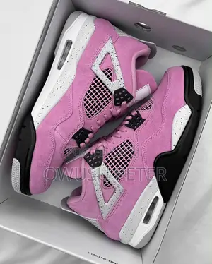 Pink Jordan 4 Retro Sneakers