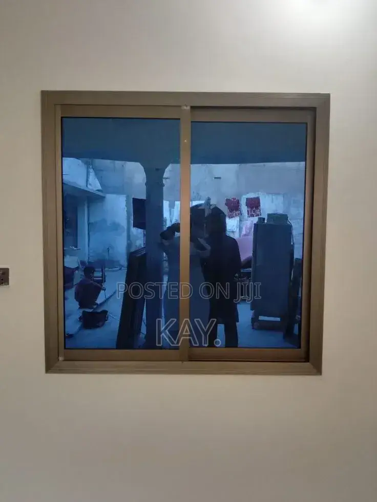 Aluminium Sliding Window With Tinted Glass – Durable & Modern Design