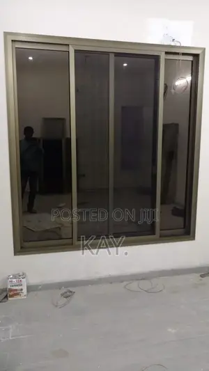 Aluminium Sliding Window With Tinted Glass – Durable & Modern Design