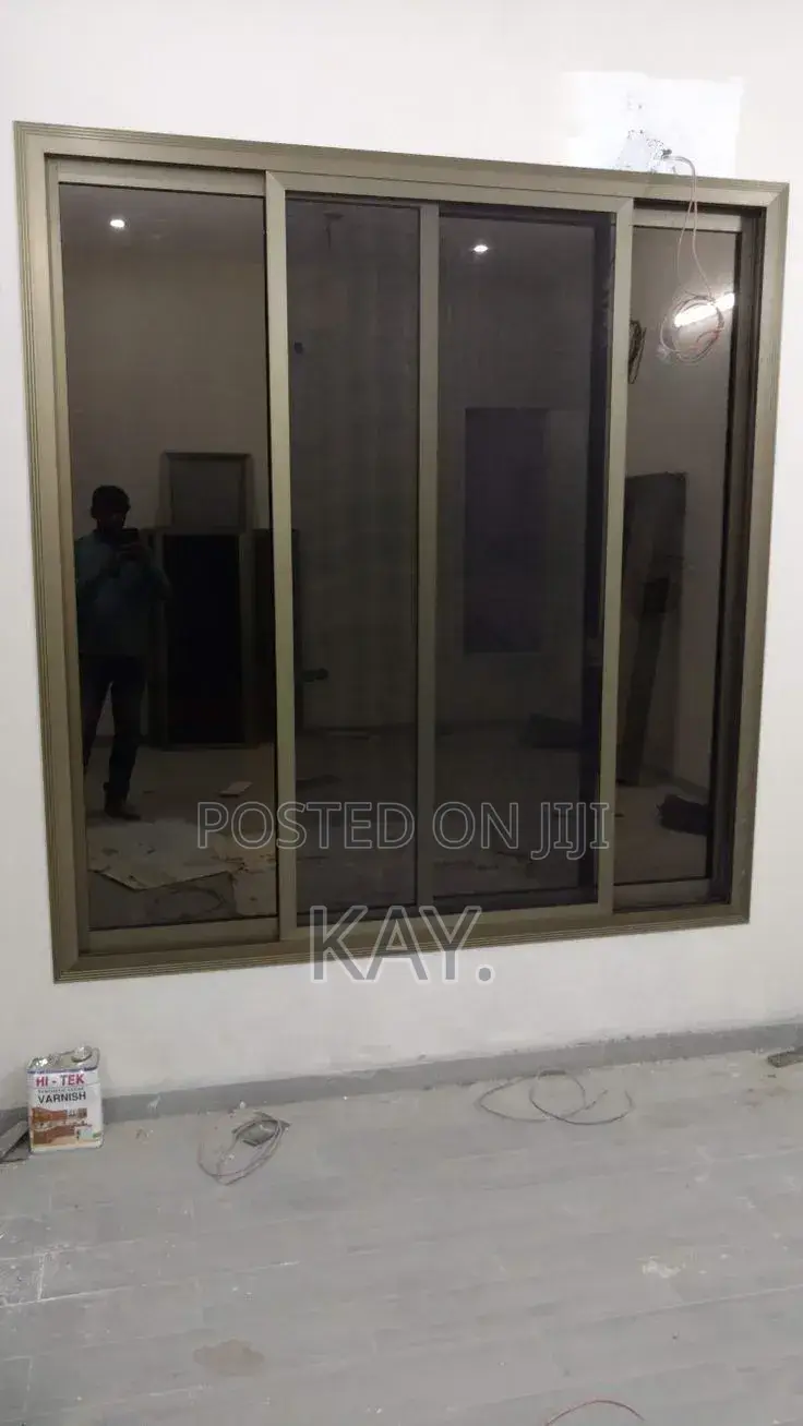 Aluminium Sliding Window With Tinted Glass – Durable & Modern Design