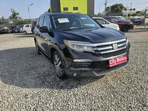 Honda Pilot Touring 4dr SUV 4WD (3.5L 6cyl 9A) 2016 Black