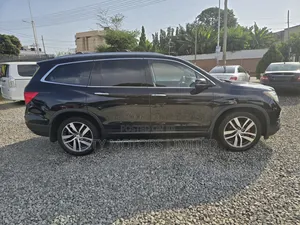 Honda Pilot Touring 4dr SUV 4WD (3.5L 6cyl 9A) 2016 Black