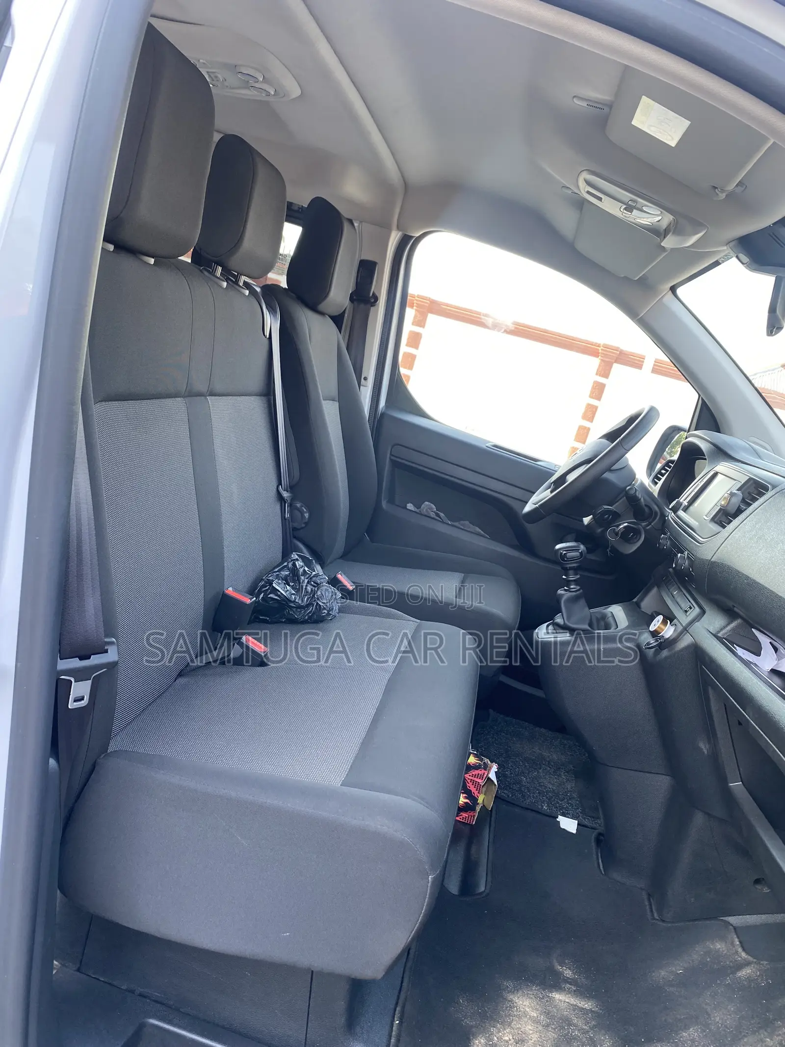 9 Seater Toyota Bus for Rent