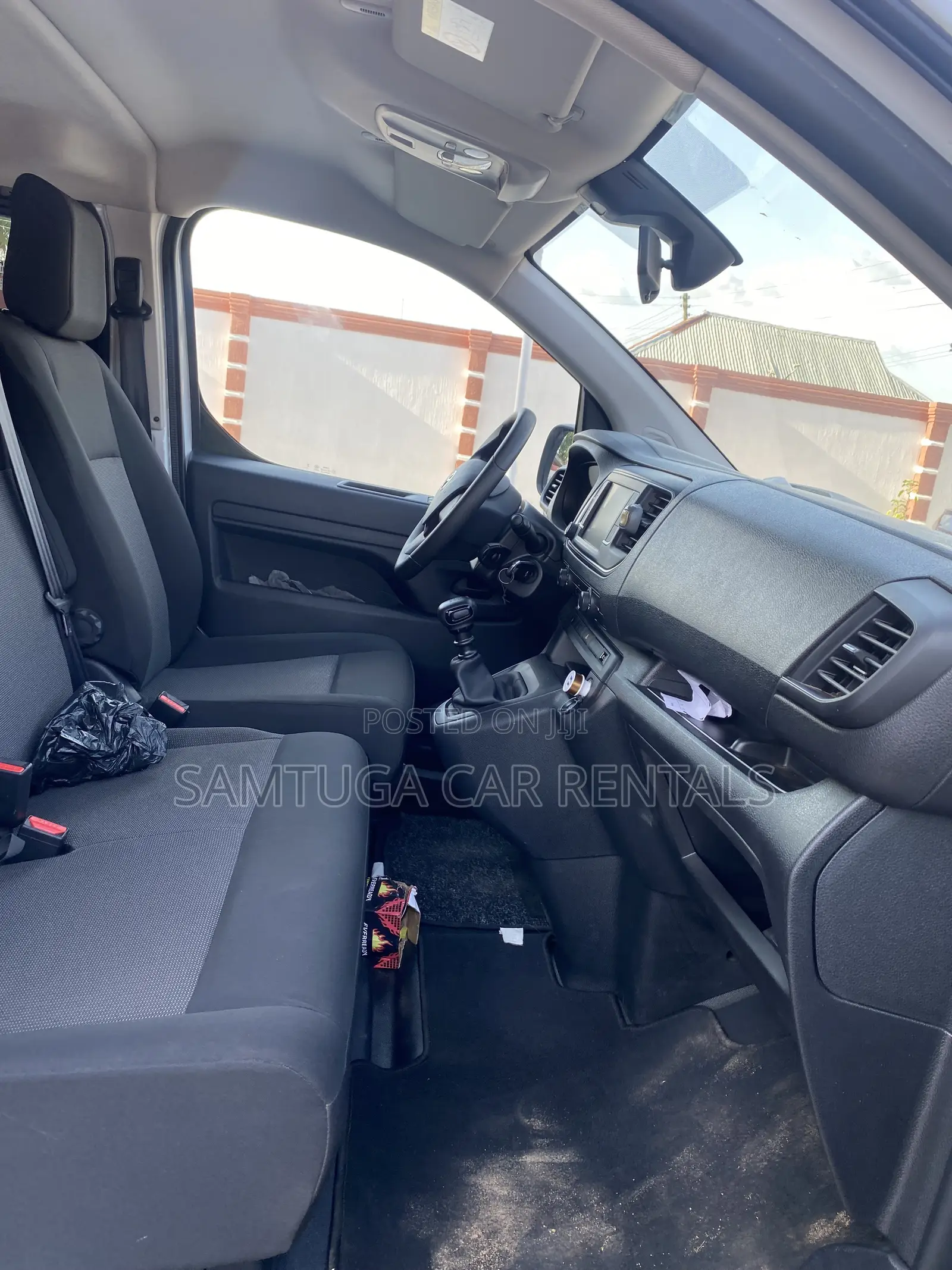 9 Seater Toyota Bus for Rent