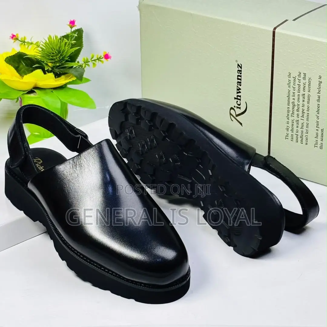 Richwanz Black Clog Mules Heel Strap and a Chunky Lug Sole.