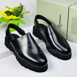 Richwanz Black Clog Mules Heel Strap and a Chunky Lug Sole.