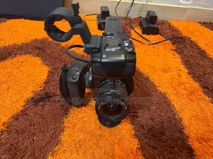 Canon C100 Video Camera With 10-18mm Lens