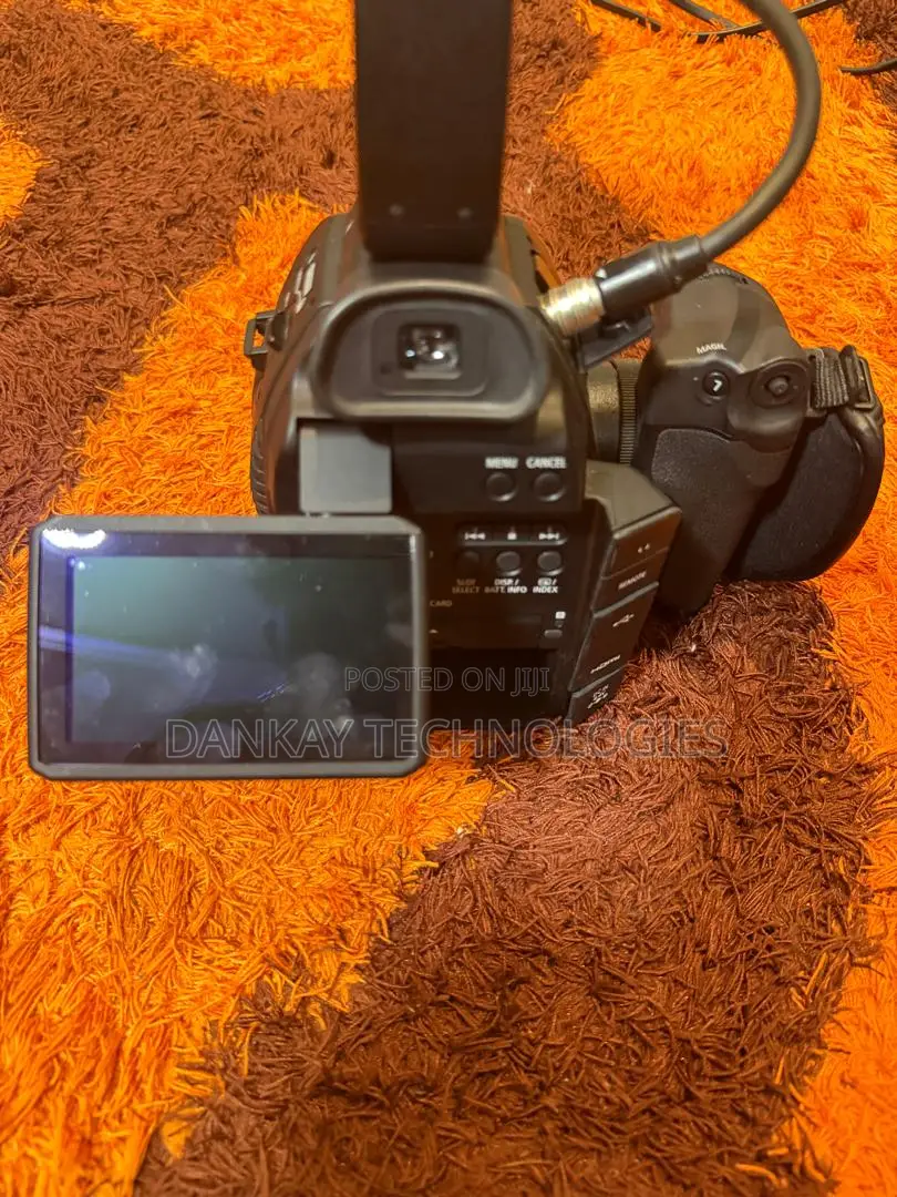 Canon C100 Video Camera With 10-18mm Lens