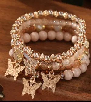 ​Handcrafted Pink Beaded Charm Bracelets - Set of 4