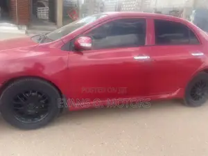 Toyota Corolla Base 4dr Sedan (1.8L 4cyl 5M) 2010 Red