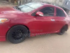 Toyota Corolla Base 4dr Sedan (1.8L 4cyl 5M) 2010 Red